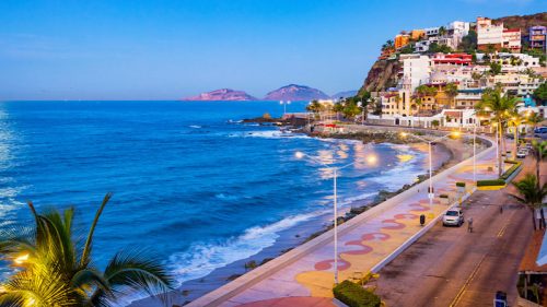 Stock photograph of the waterfront in Mazatlan, Sinaloa, Mexico at twilight.